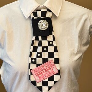 Checkered Black and White Tie with Pink Patch